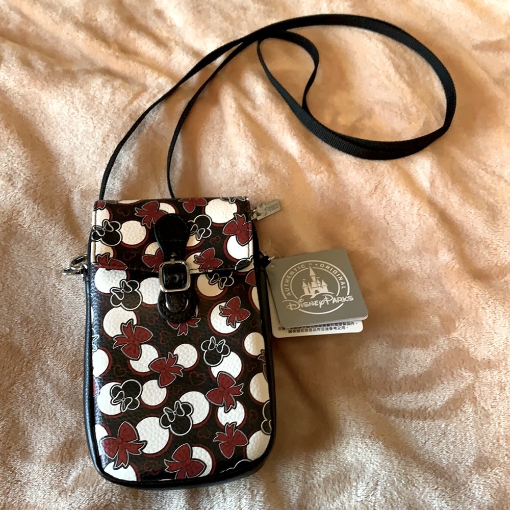 New used Disney Cell phone holder and purse.